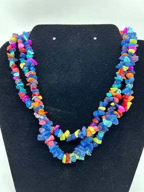 Multi strand colorful beaded stone pieces necklace.